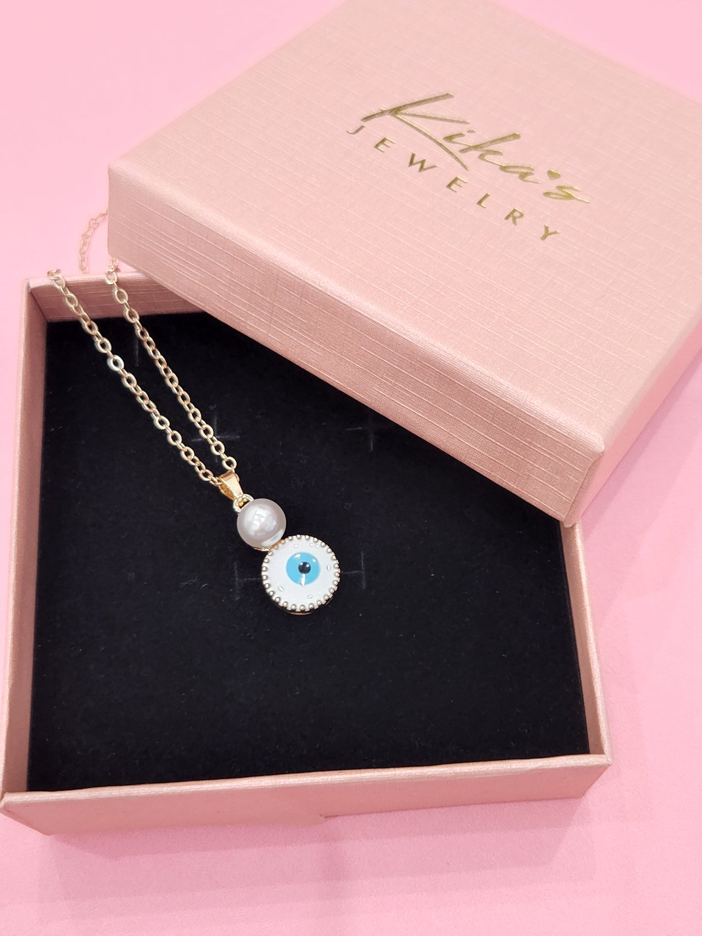 Collar de protección contra el mal de ojo de cobre con perlas