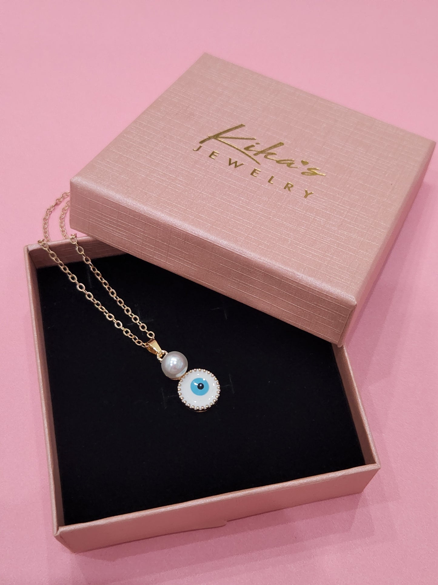 Collar de protección contra el mal de ojo de cobre con perlas