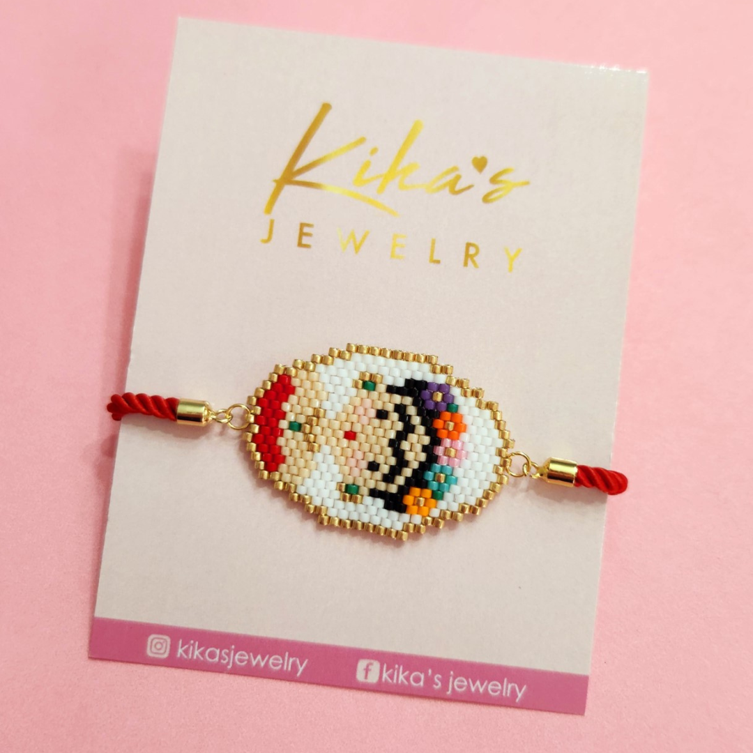 Bonito collar inspirado en Frida Kahlo con cuentas rosas